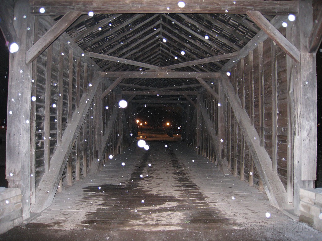 Henry Ford Christmas 2009 041.jpg - Snowing on the covered bridge.